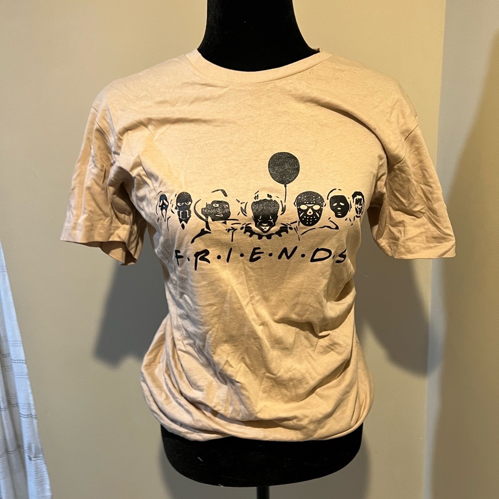 Tan with black decals “friends” Halloween tee shirt